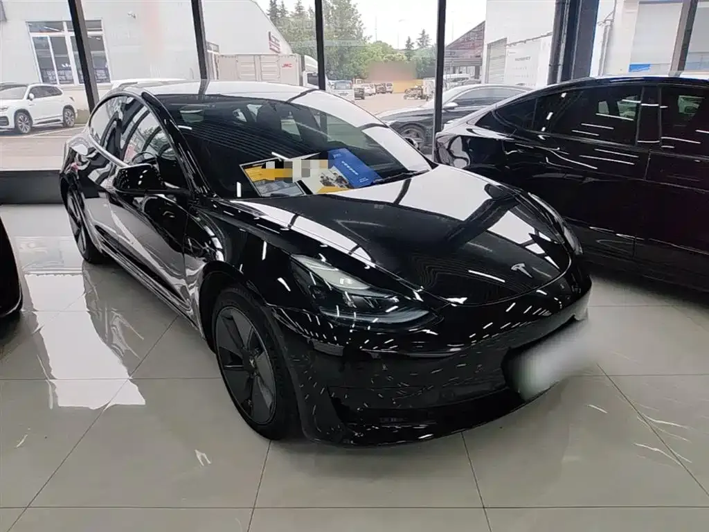 Tesla Model 3 — фото 4