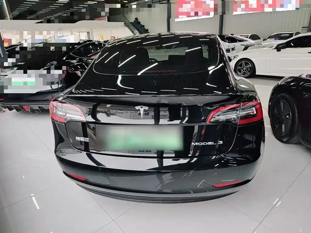 Tesla Model 3 — фото 7