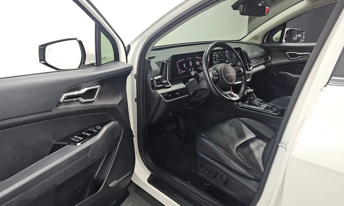 Kia Sportage — фото 10