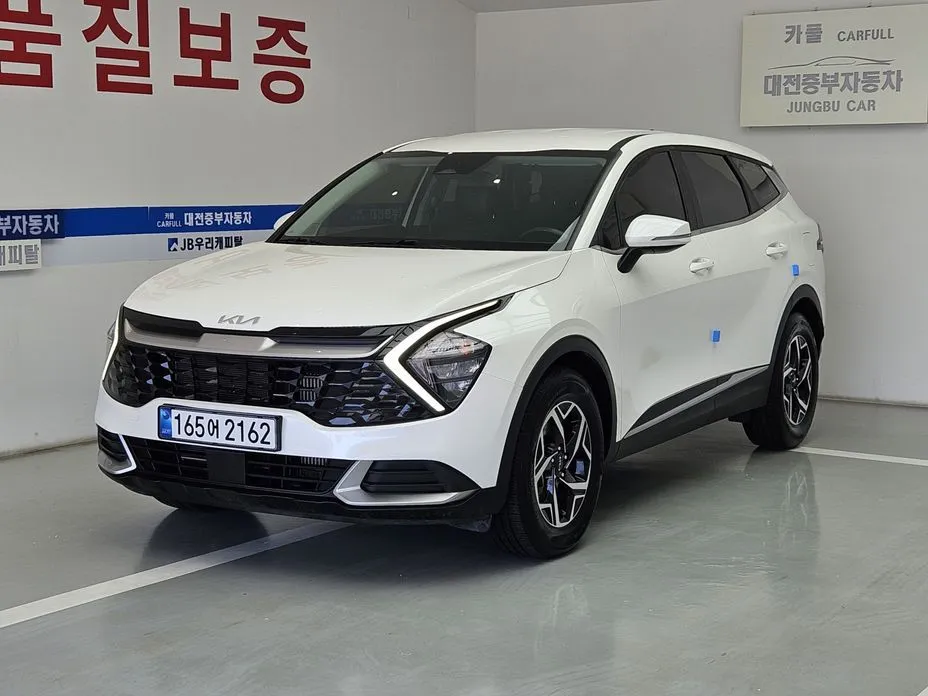 Kia Sportage — фото 1