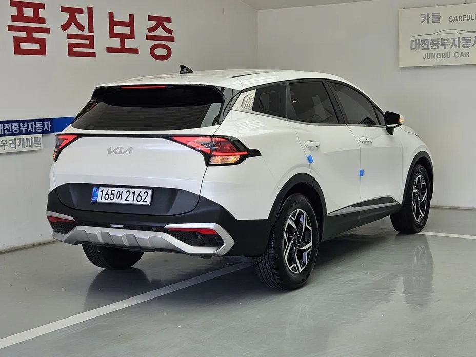 Kia Sportage — фото 7