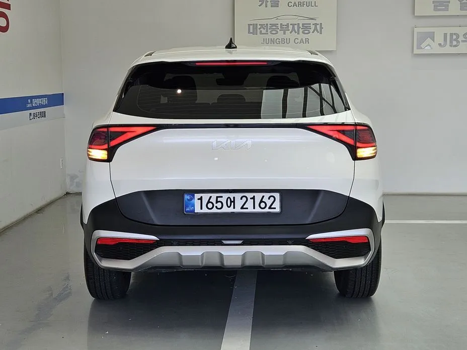 Kia Sportage — фото 8
