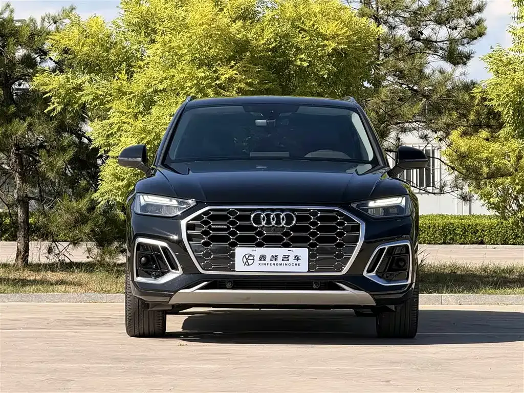 Audi Q5L — фото 5