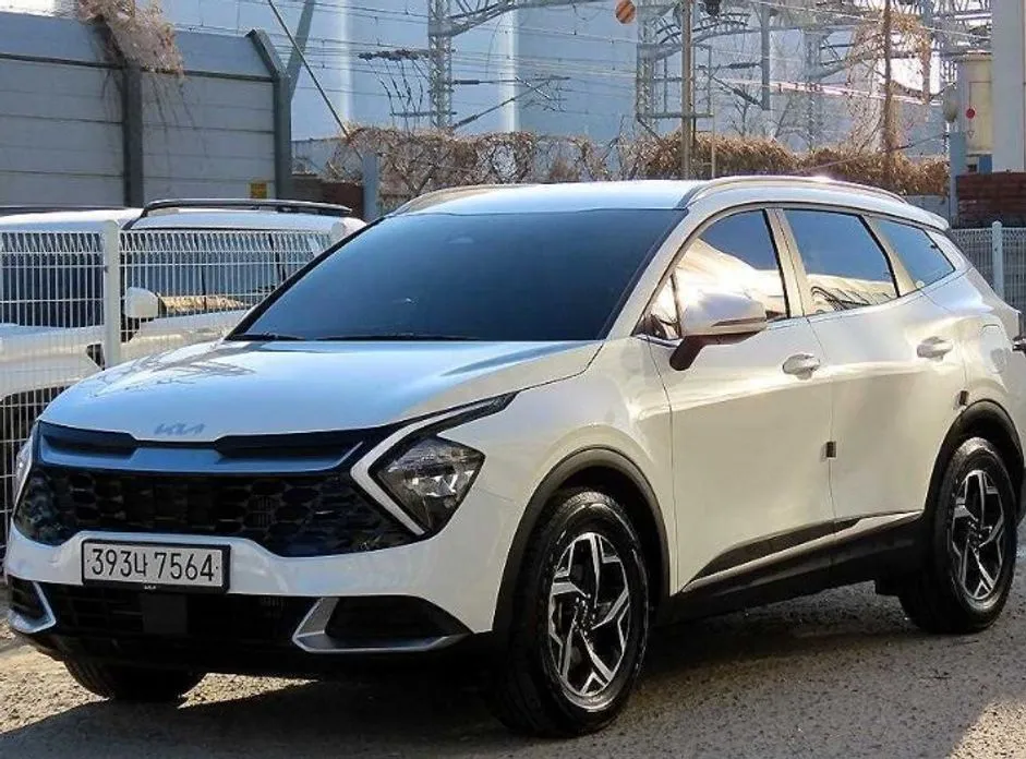 Kia Sportage — фото 7