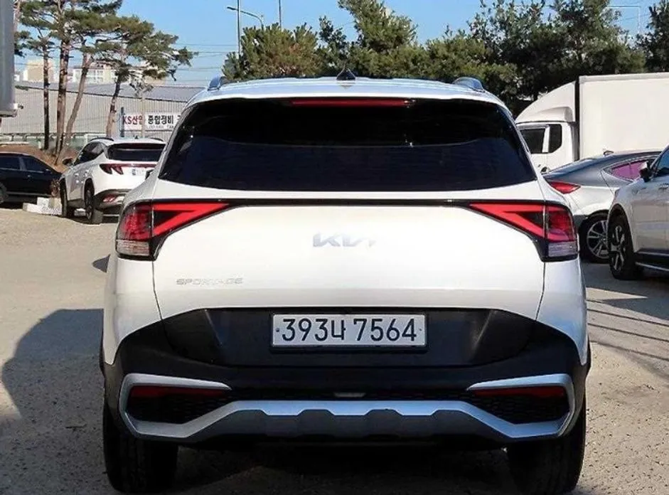 Kia Sportage — фото 8