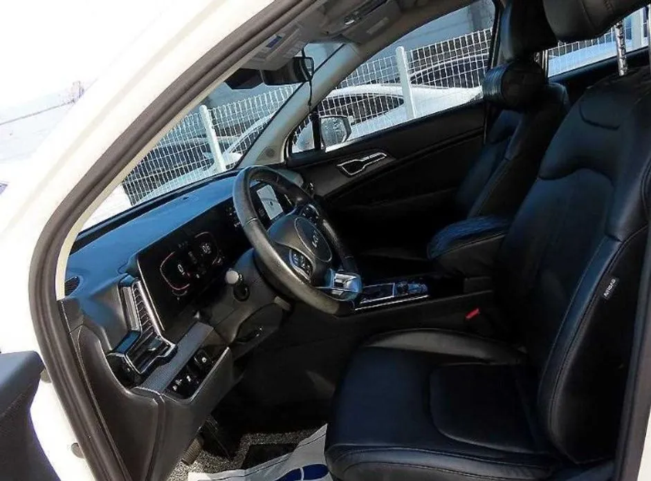 Kia Sportage — фото 5