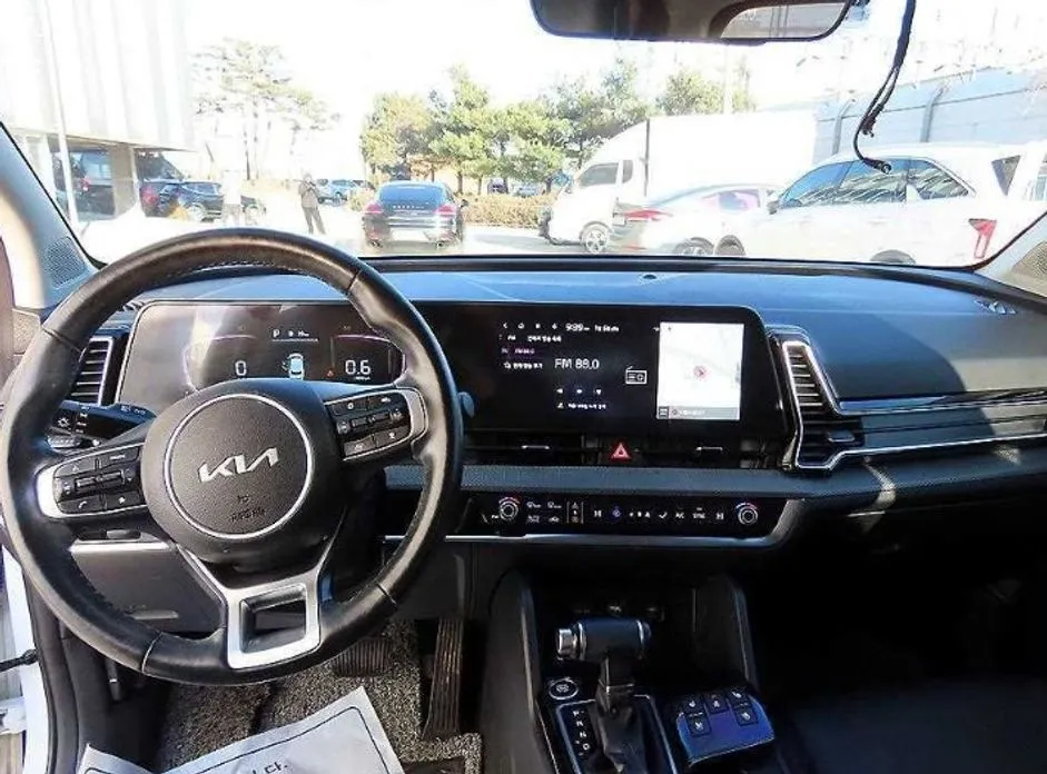 Kia Sportage — фото 10