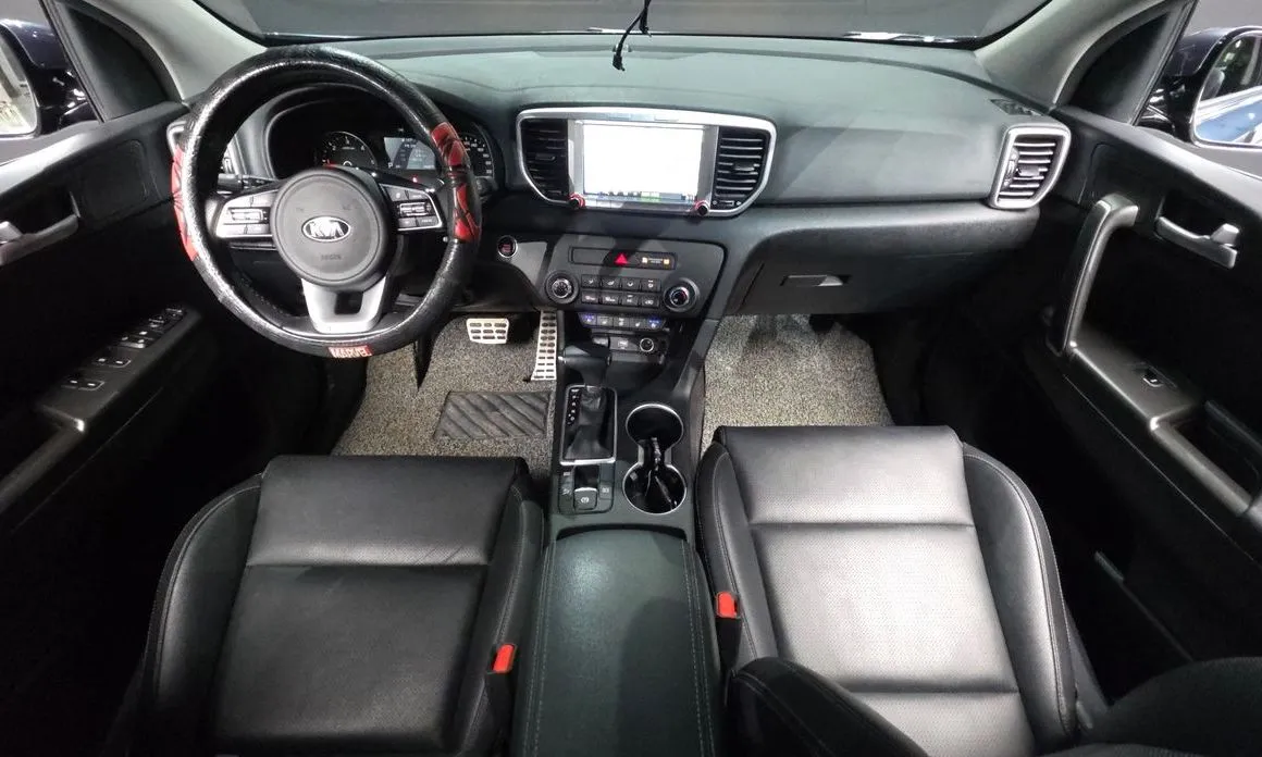 Kia Sportage — фото 8