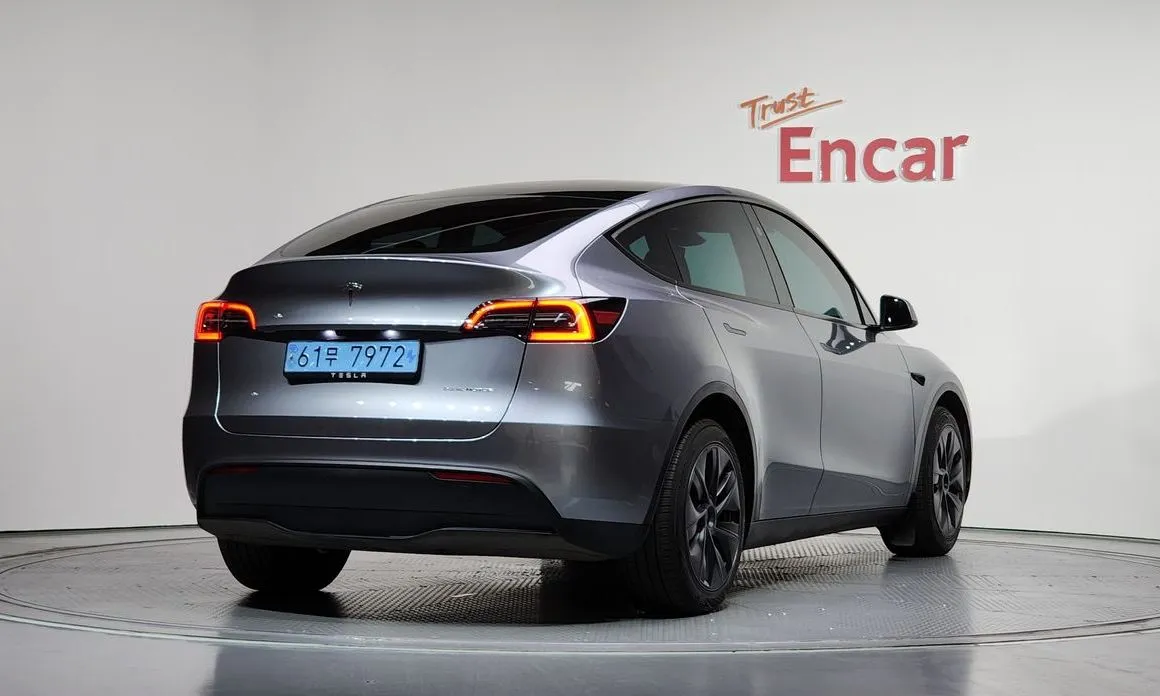 Tesla Model Y — фото 7