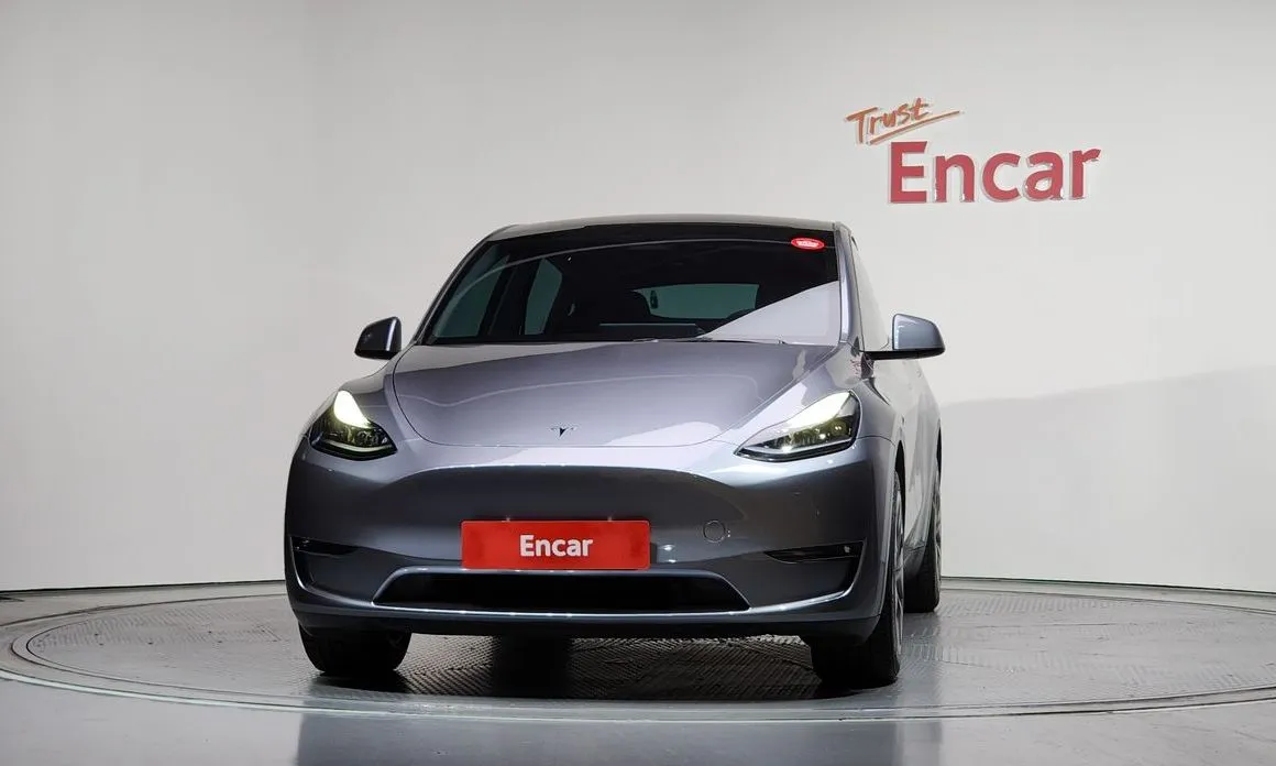 Tesla Model Y — фото 10