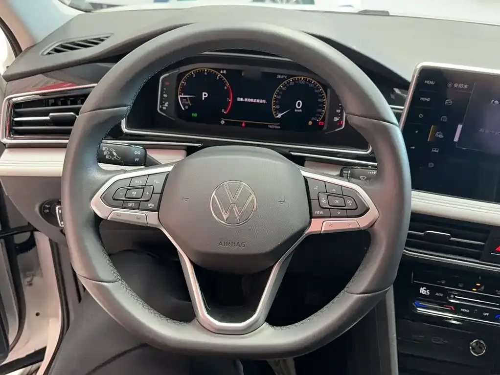 Volkswagen Tiguan L — фото 7