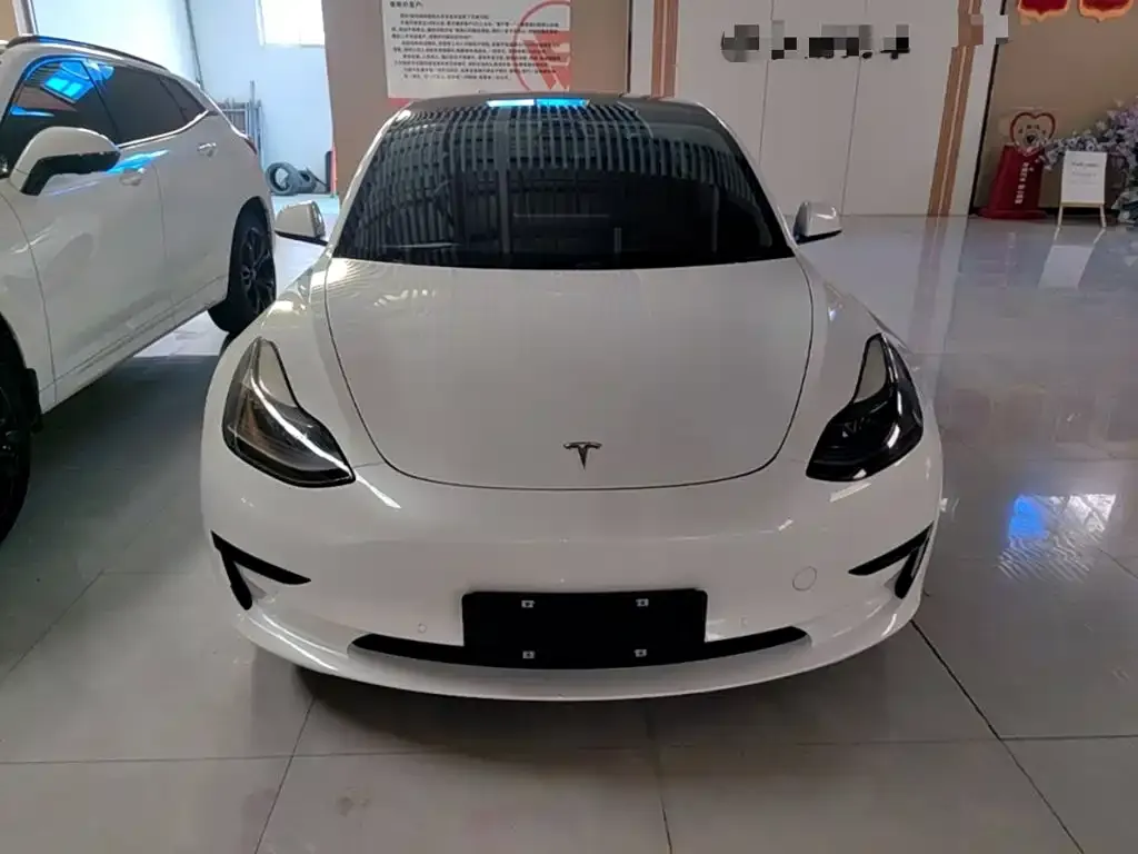 Tesla Model 3 — фото 6