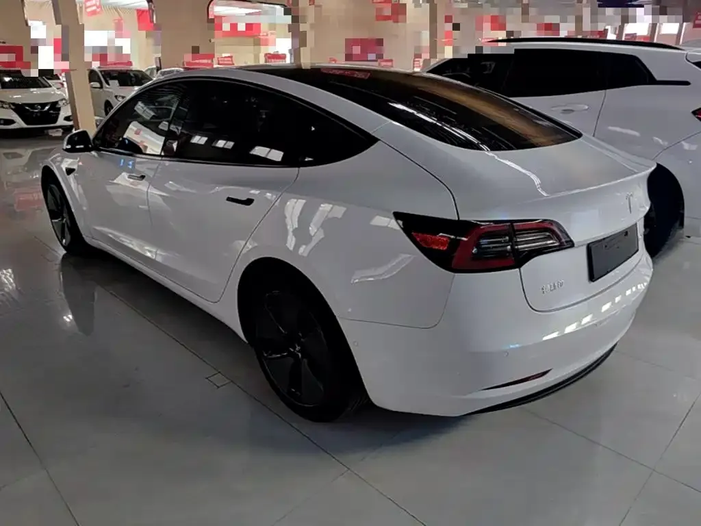 Tesla Model 3 — фото 8