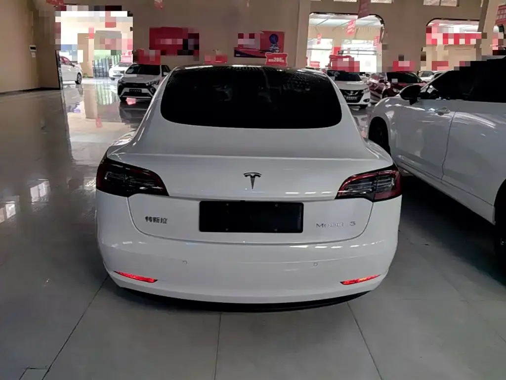 Tesla Model 3 — фото 5