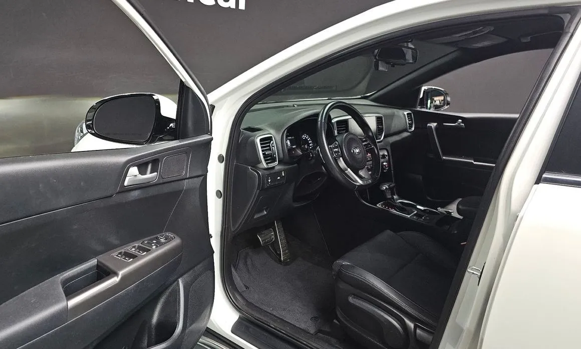Kia Sportage — фото 10