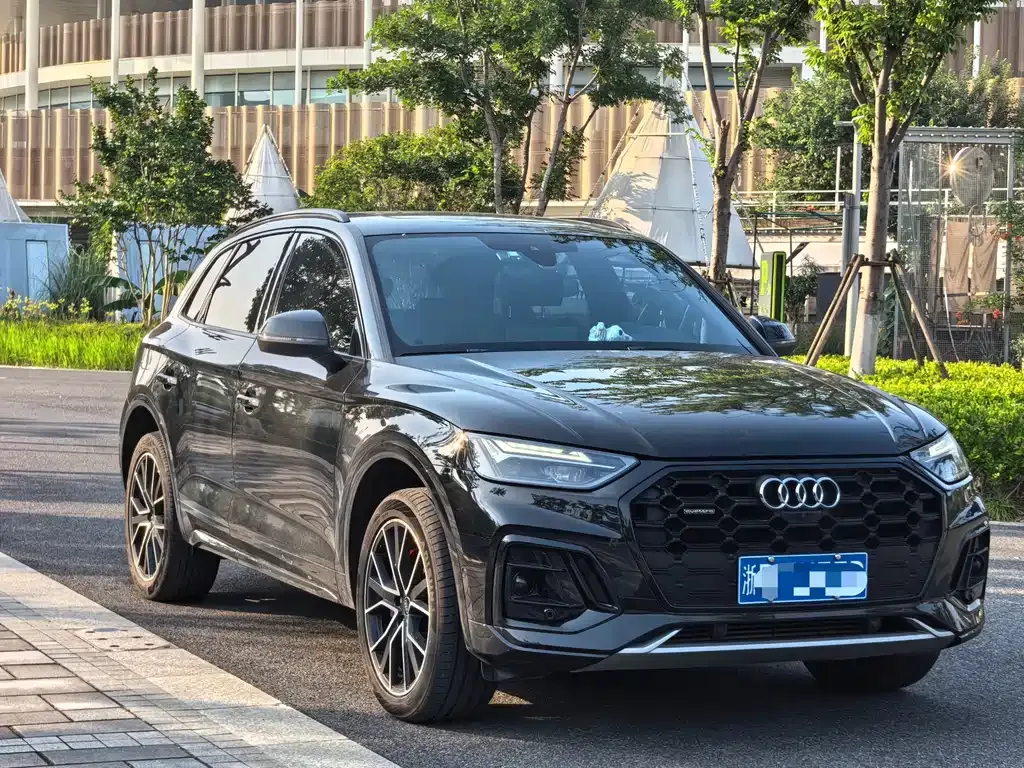 Audi Q5L — фото 10