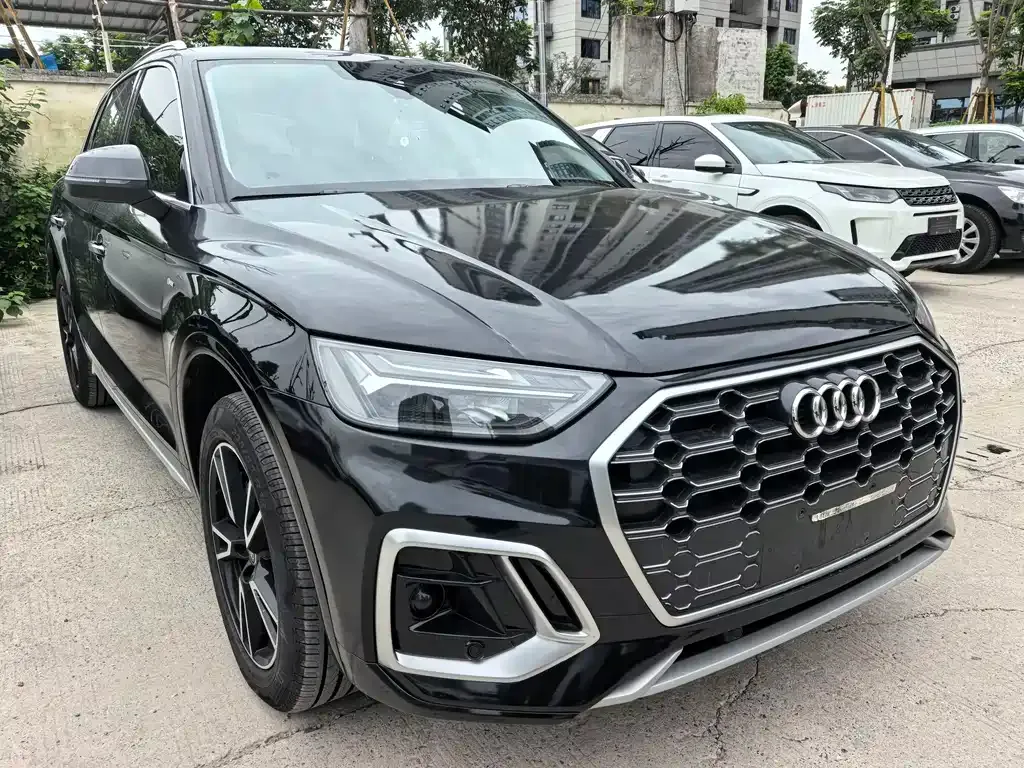 Audi Q5L — фото 5