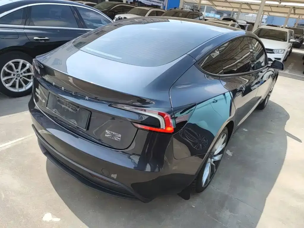 Tesla Model 3 — фото 10