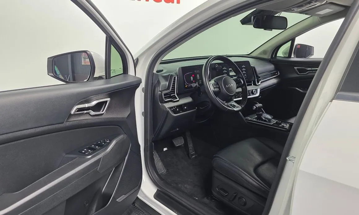 Kia Sportage — фото 10