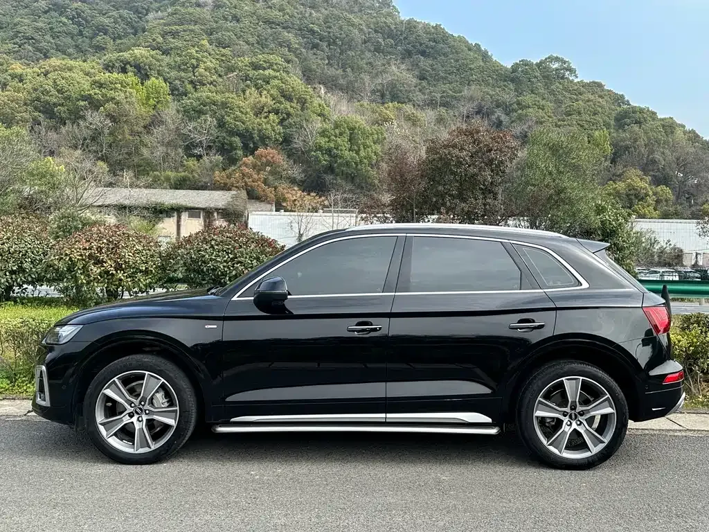 Audi Q5L — фото 7