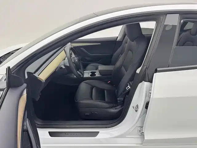 Tesla Model 3 — фото 5