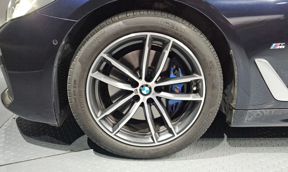 BMW 5-Series — фото 10