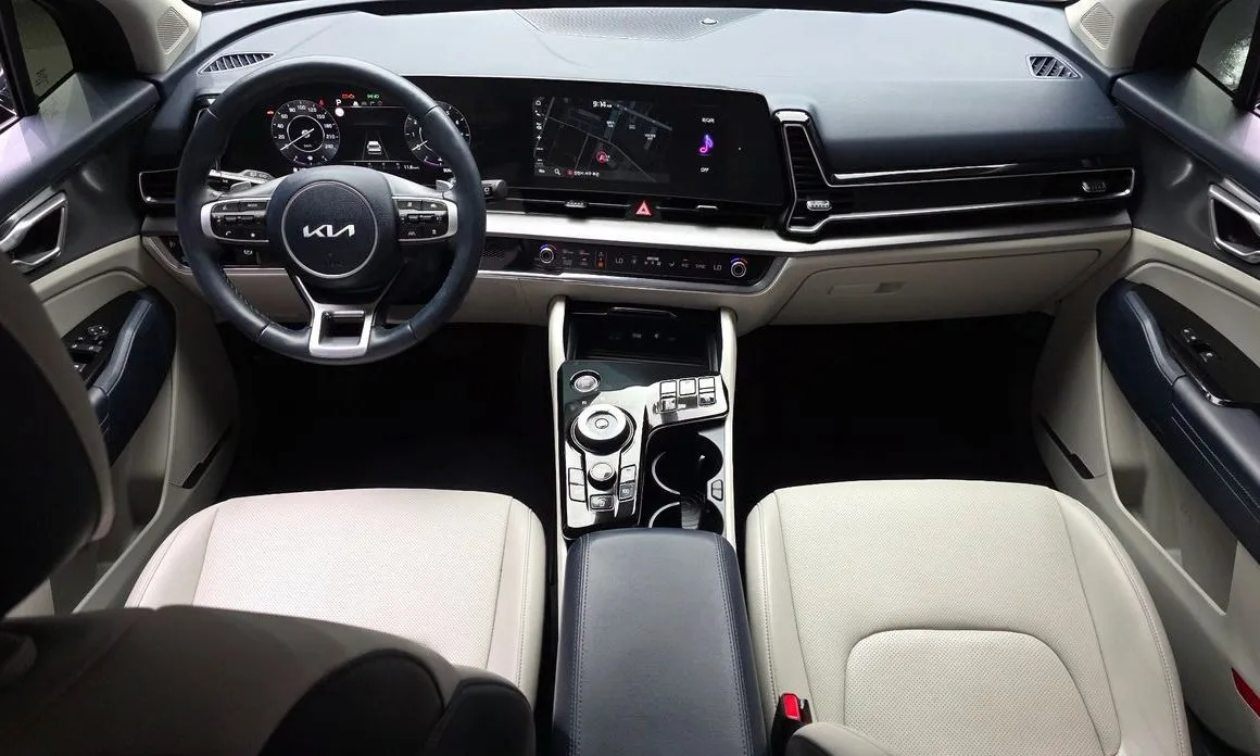 Kia Sportage — фото 9
