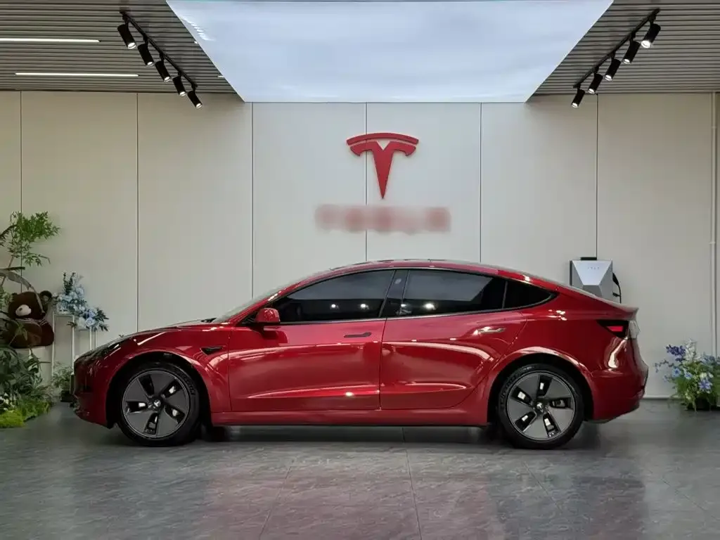 Tesla Model 3 — фото 7