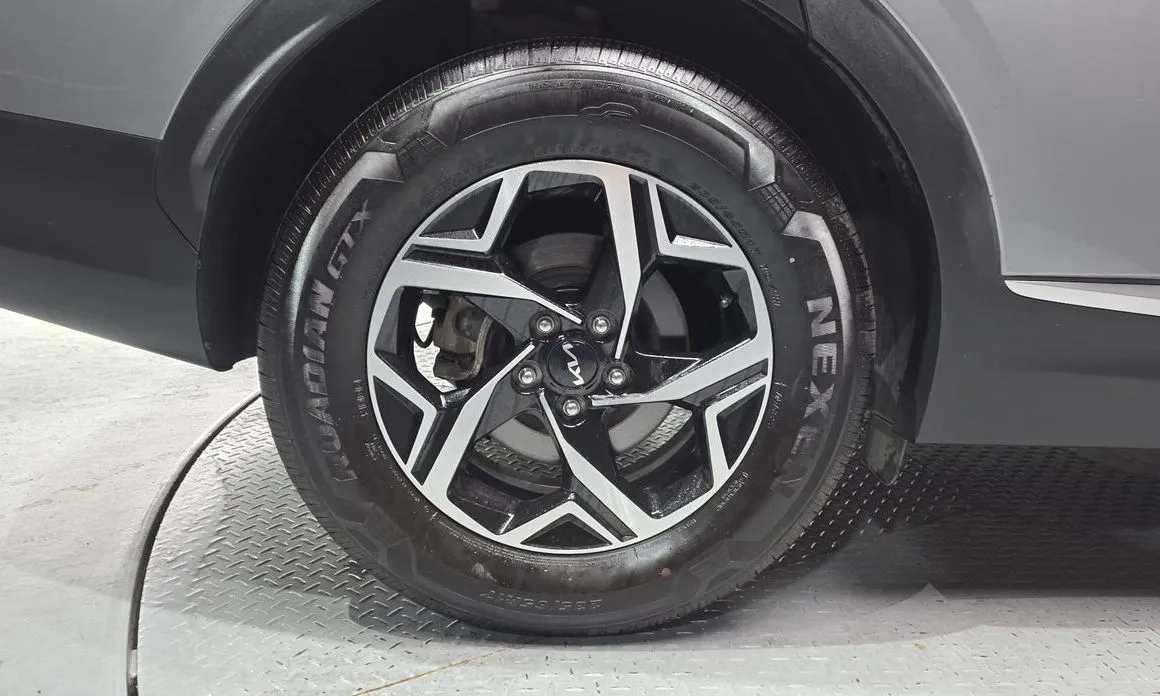 Kia Sportage — фото 10