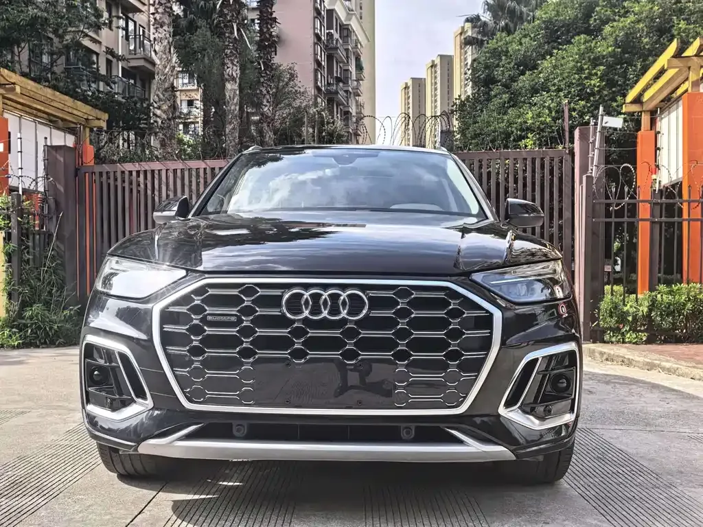 Audi Q5L — фото 10