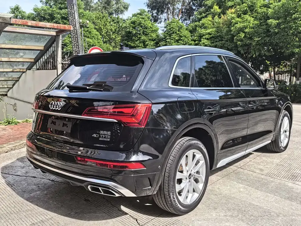 Audi Q5L — фото 9