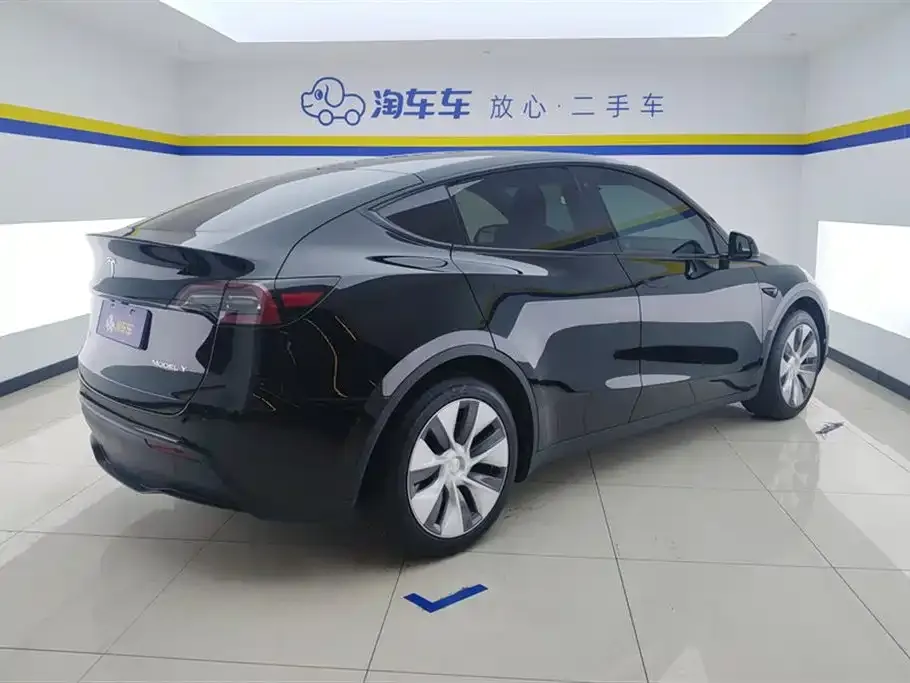 Tesla Model Y — фото 7