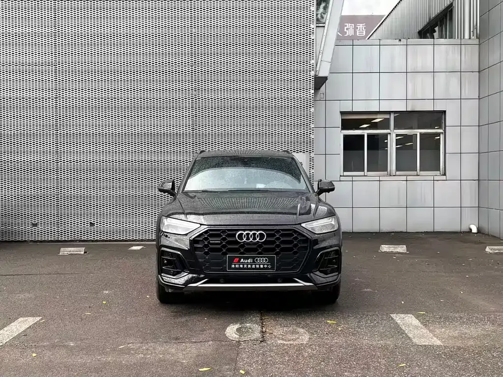 Audi Q5L — фото 8