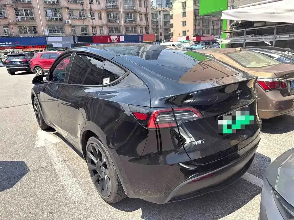 Tesla Model Y — фото 7