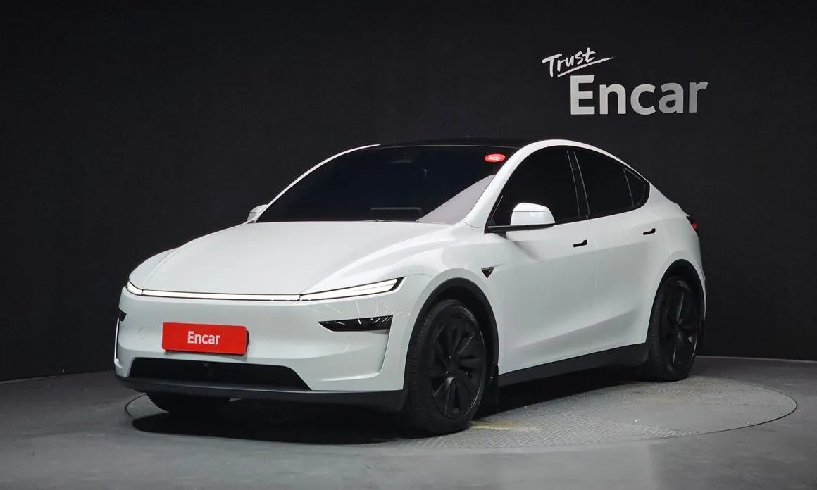 Tesla Model Y — фото 1