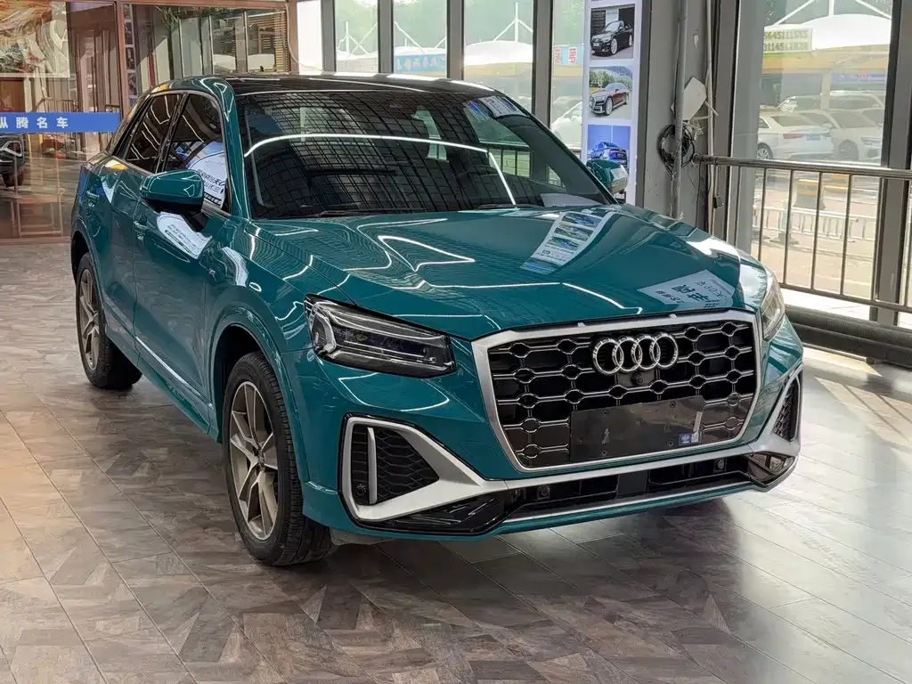 Audi Q2L — фото 9