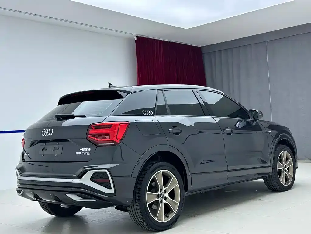 Audi Q2L — фото 6
