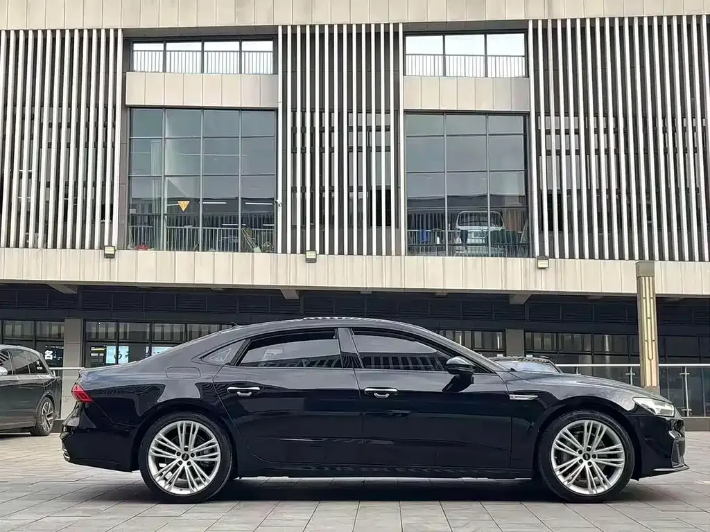 Audi A7L — фото 7