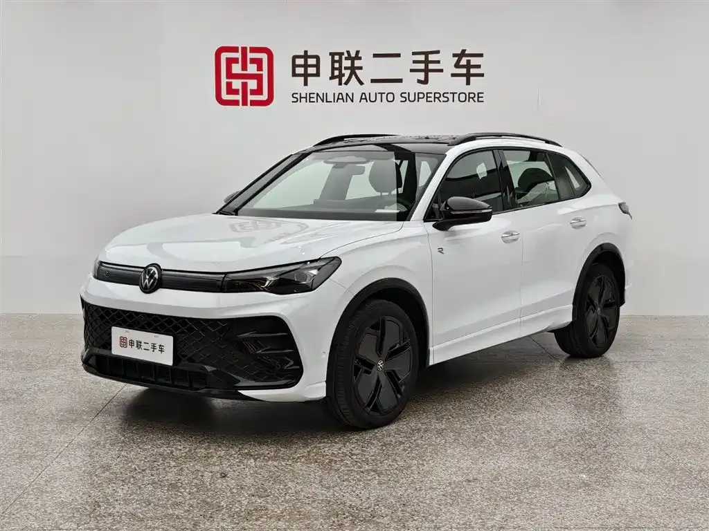 Volkswagen Tiguan L — фото 1
