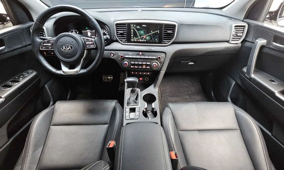 Kia Sportage — фото 8