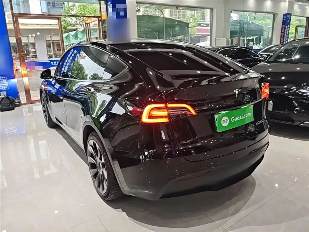 Tesla Model Y — фото 7