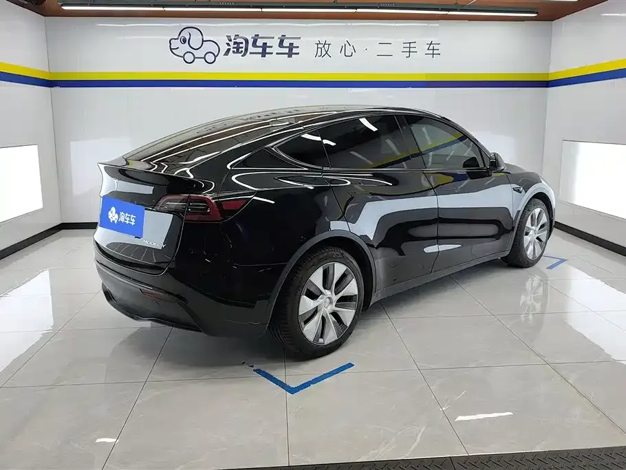 Tesla Model Y — фото 9