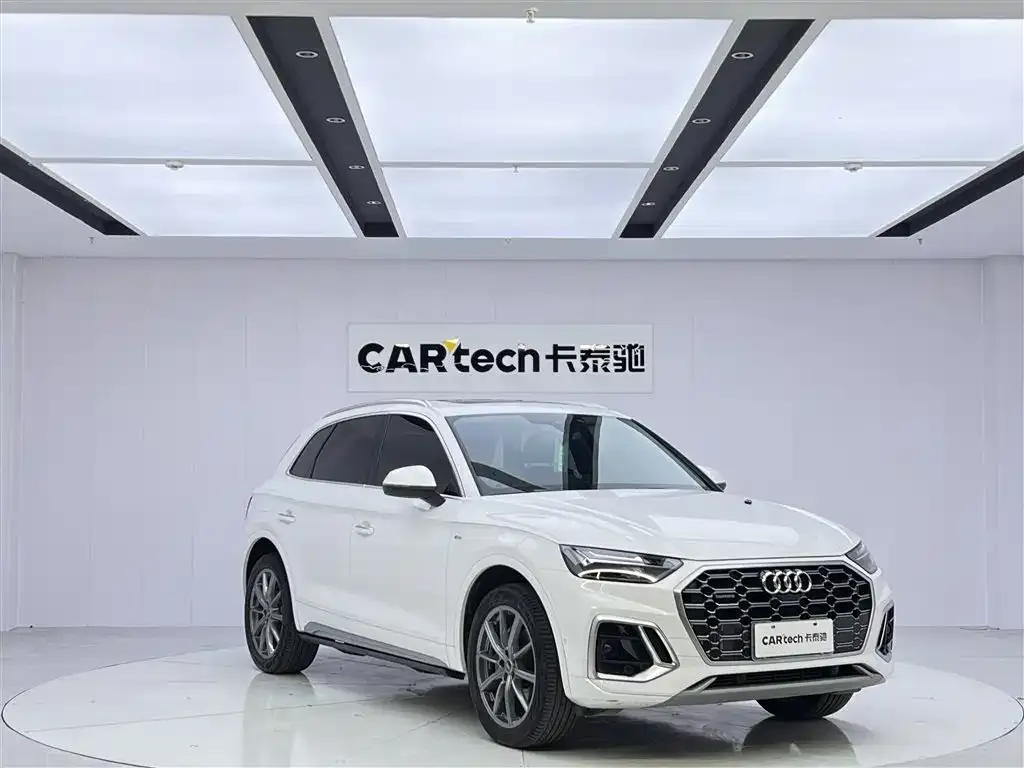 Audi Q5L — фото 5