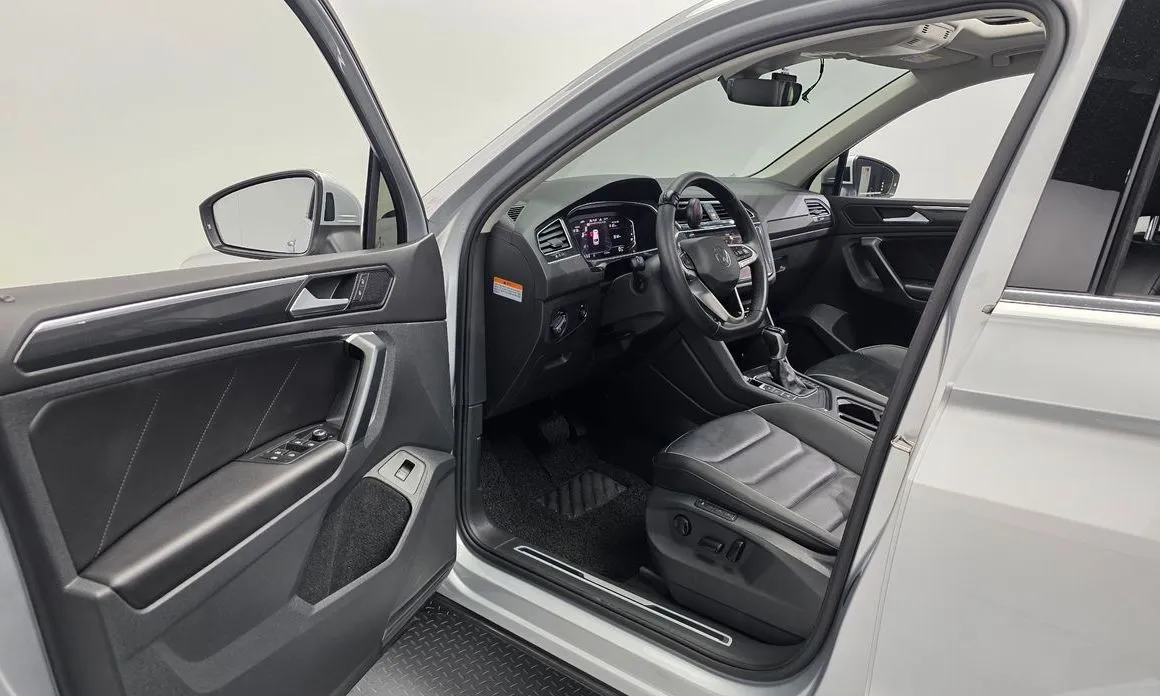 Volkswagen Tiguan — фото 9