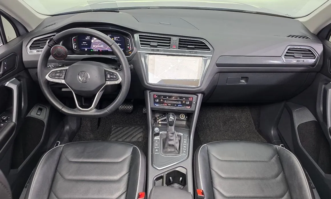 Volkswagen Tiguan — фото 10