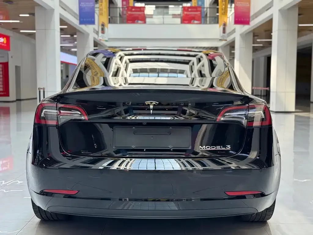 Tesla Model 3 — фото 7