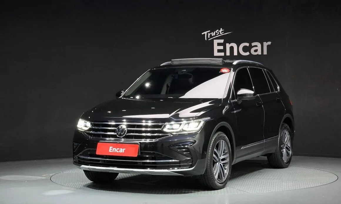 Volkswagen Tiguan — фото 1