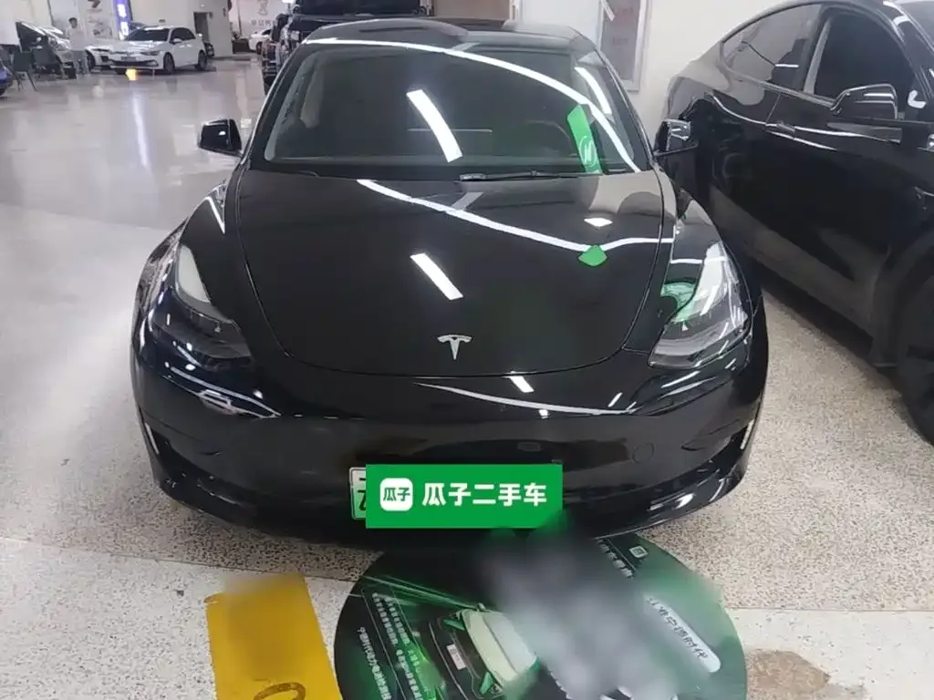 Tesla Model 3 — фото 5