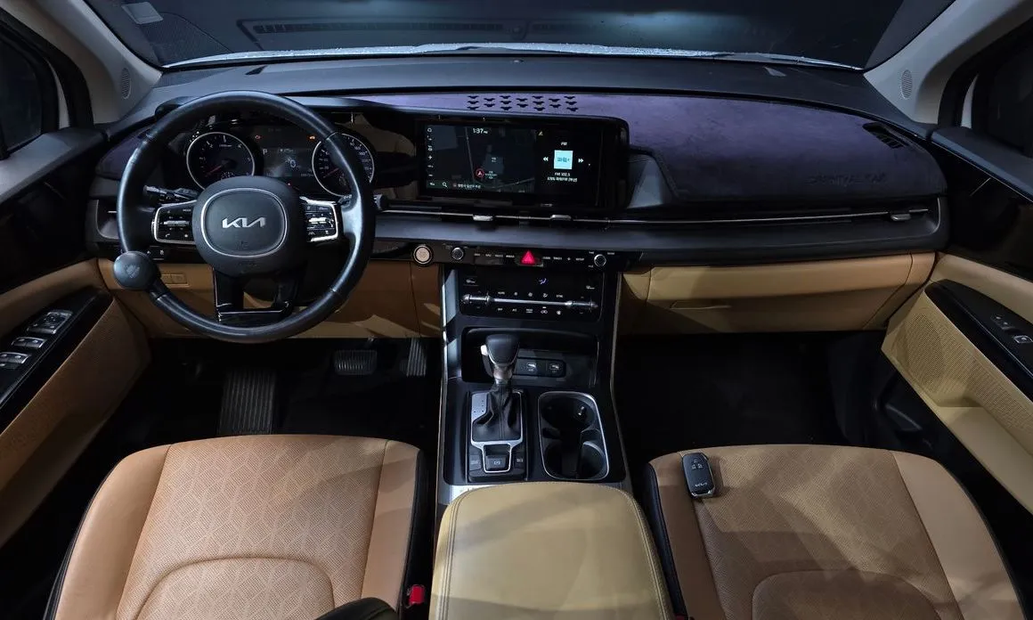 Kia Carnival — фото 10