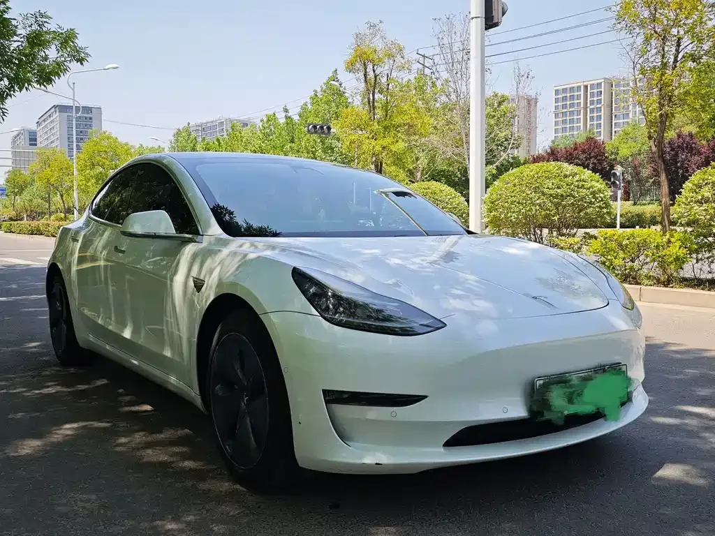 Tesla Model 3 — фото 8